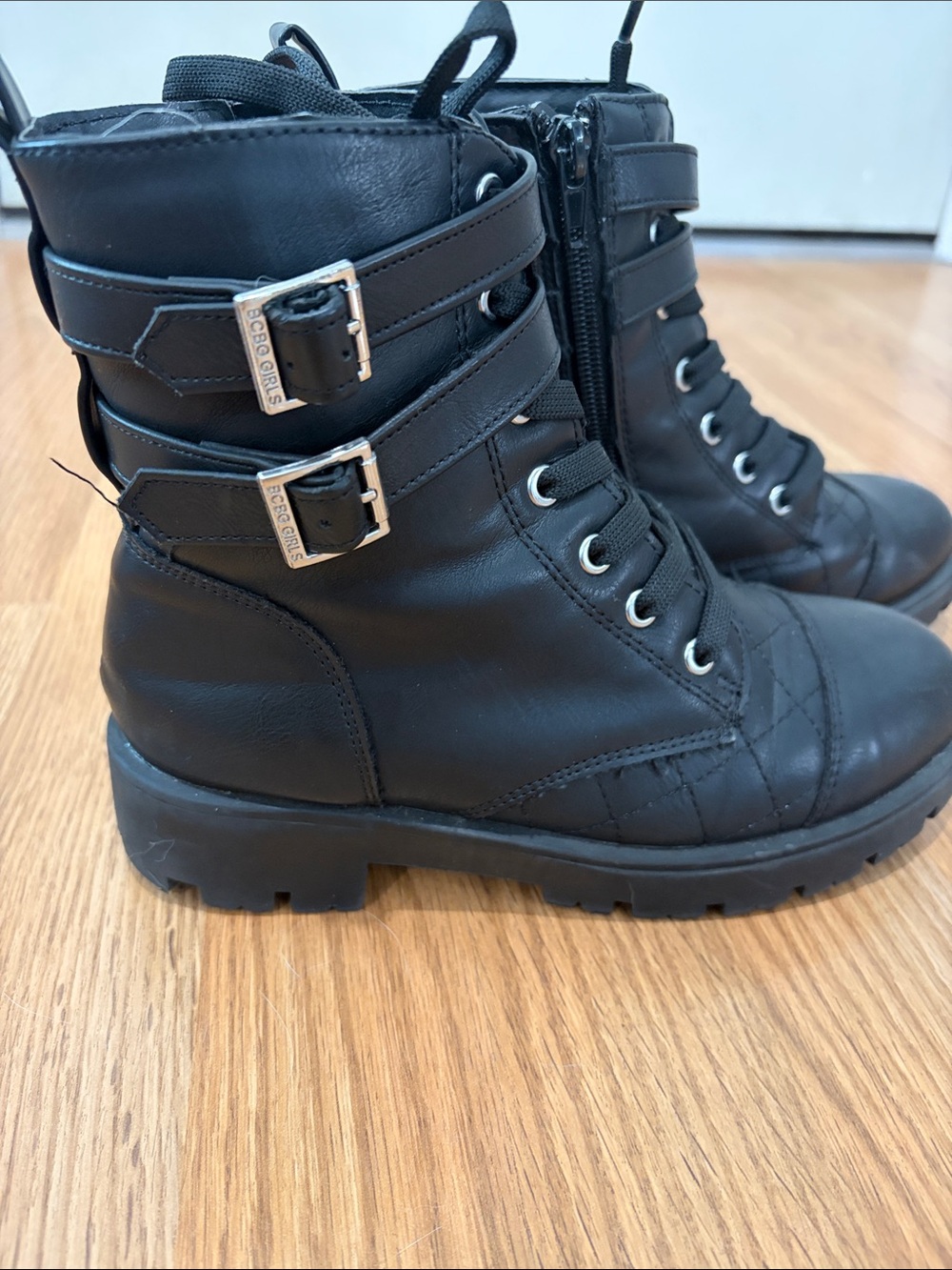 BCBGirls Black Lace-Up Combat Boots with Dual Buckle Straps